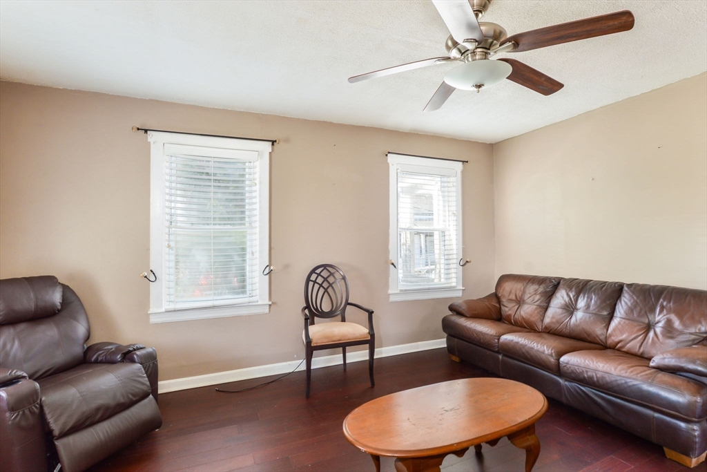 58 Downing Street Fall River, MA 02723 - Photo 5 of 41 a living room with furniture a window and a potted plant