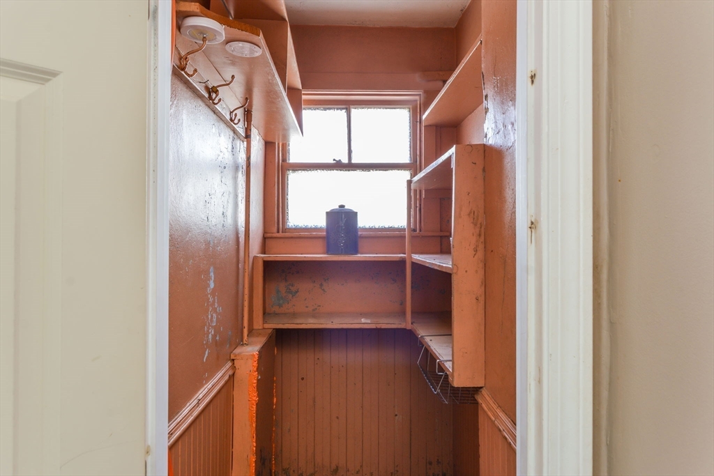 58 Downing Street Fall River, MA 02723 - Photo 9 of 41 a view of walk in closet with empty racks