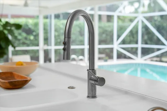 swimming pool view with a outdoor seating space