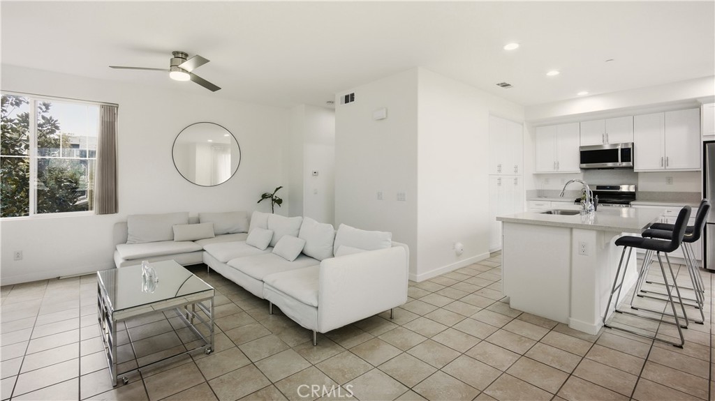 713 South Azusa Avenue, Unit A Azusa, CA 91702 - Photo 13 of 31 a living room with furniture and a window