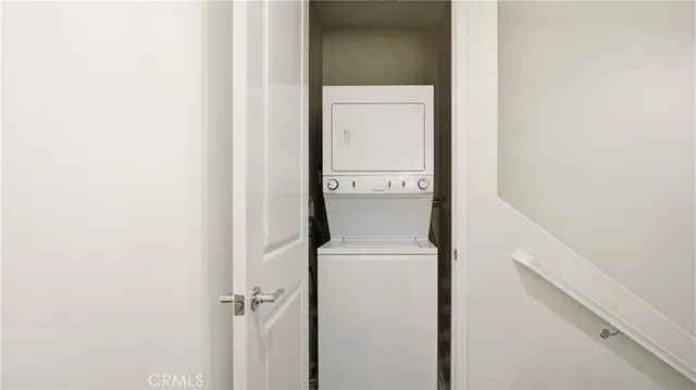 a bathroom with double vanity sink and a mirror