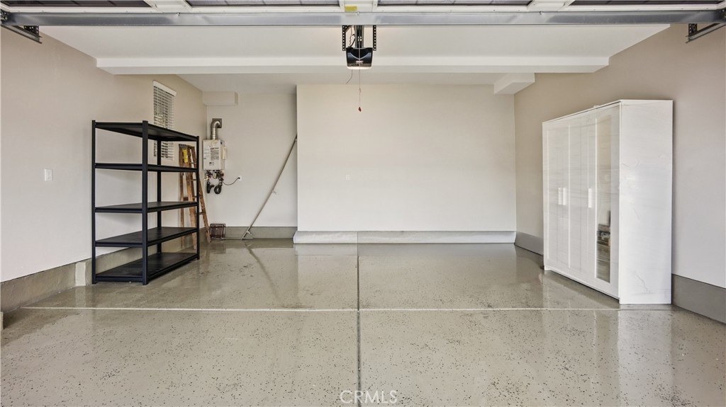 713 South Azusa Avenue, Unit A Azusa, CA 91702 - Photo 27 of 31 a view of a livingroom with wooden floor and staircase