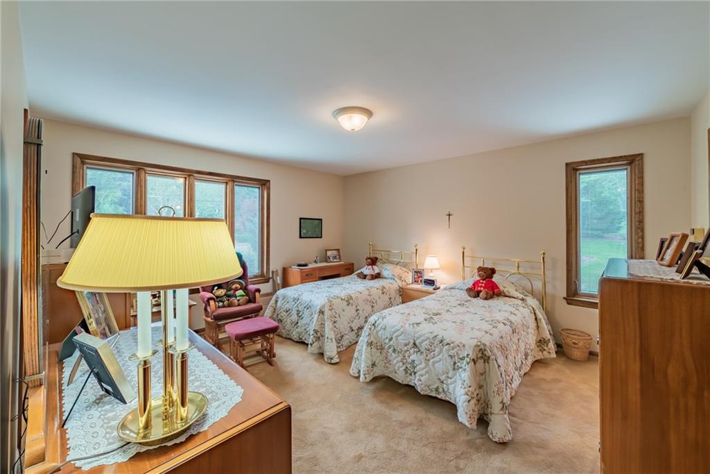 421 Center Church Road McMurray, PA 15317 - Photo 12 of 25 BEDROOM - Upper level bedroom with neutral carpeting and walls.
