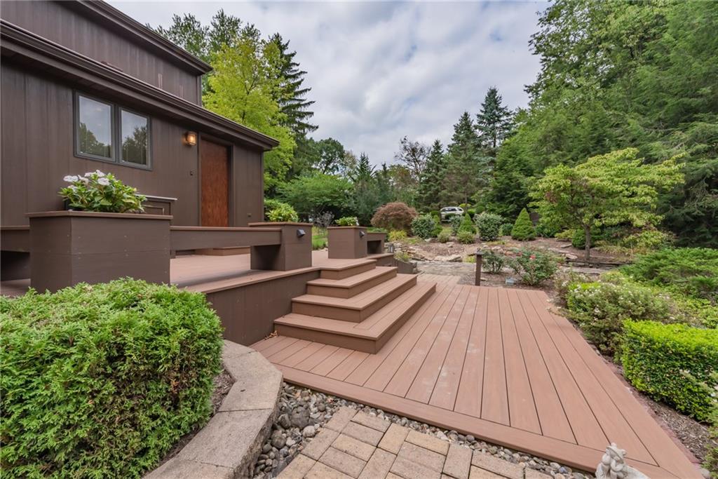 421 Center Church Road McMurray, PA 15317 - Photo 23 of 25 DECK / GROUNDS - The grounds are beautiful with perennial plantings and lighting. Relax on the decks and covered porch in the privacy of your yard.