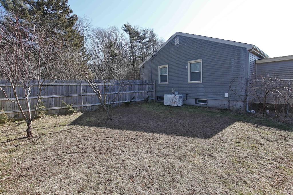 33 Gammons Road Acushnet, MA 02743 - Photo 34 of 37 a house view with a backyard space