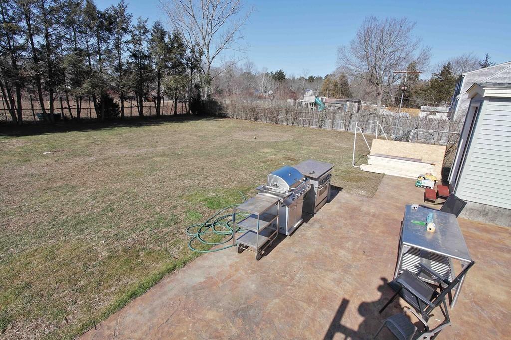 33 Gammons Road Acushnet, MA 02743 - Photo 36 of 37 a view of backyard with outdoor seating