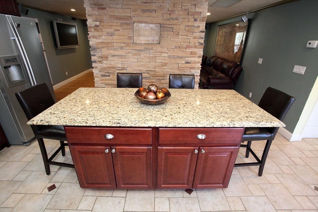 33 Gammons Road Acushnet, MA 02743 - Photo 10 of 37 a kitchen with a sink a microwave and refrigerator