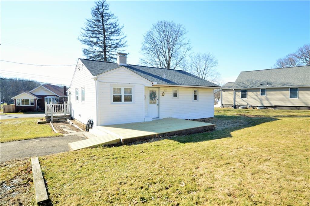 4905 Rochester Road New Brighton, PA 15066 - Photo 1 of 21 a view of a house with pool and sitting area