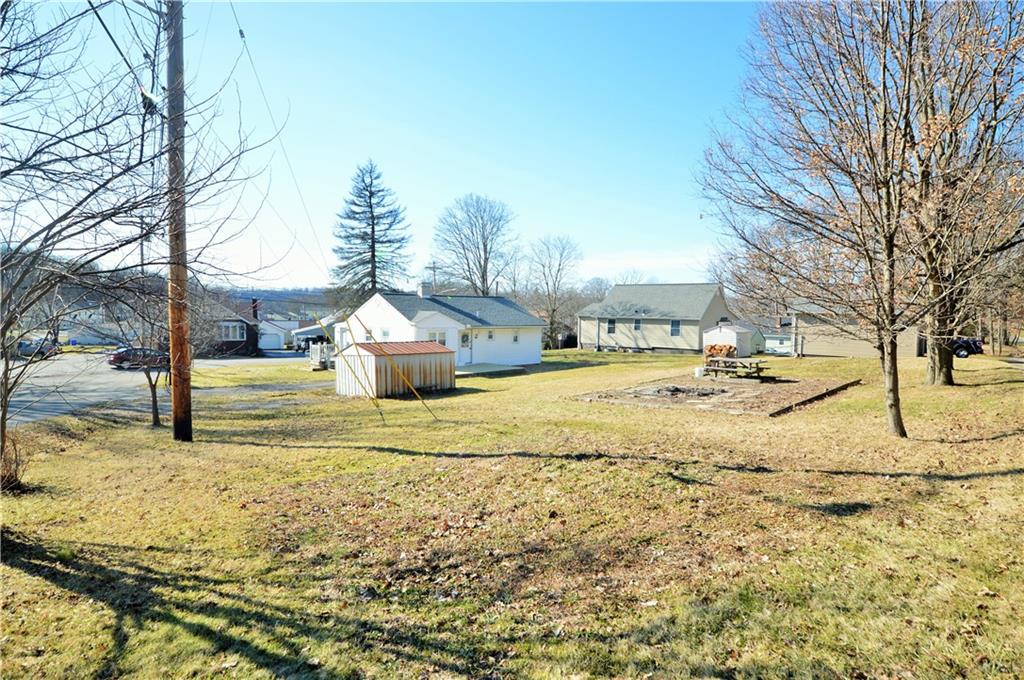 4905 Rochester Road New Brighton, PA 15066 - Photo 20 of 21 a view of road with large trees