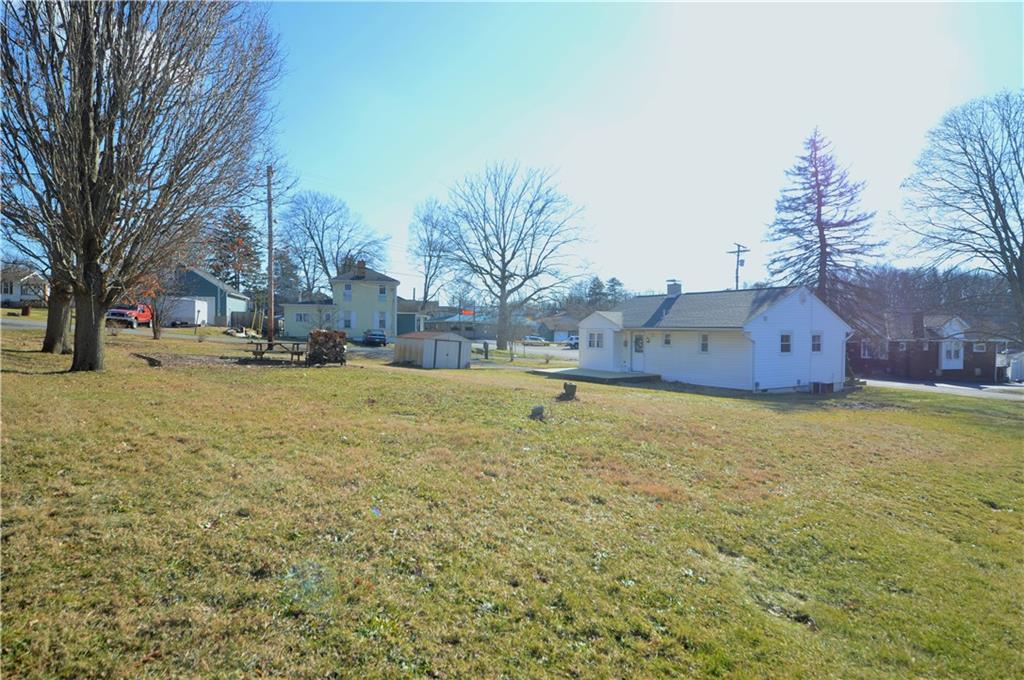 4905 Rochester Road New Brighton, PA 15066 - Photo 21 of 21 a view of a yard with a house