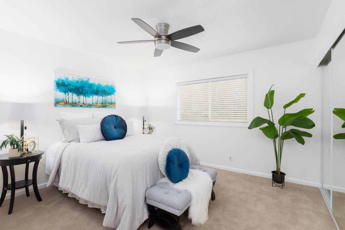 1226 Roxbury Court Santa Clara, CA 95050 - Photo 14 of 35 a bedroom with a bed a chandelier and a window