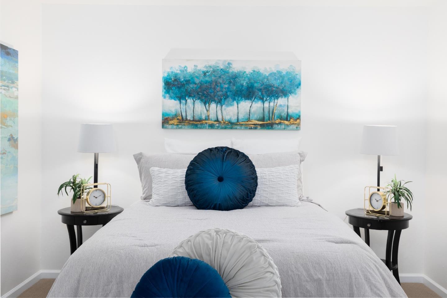 1226 Roxbury Court Santa Clara, CA 95050 - Photo 15 of 35 a bedroom with a bed and a painting on the wall