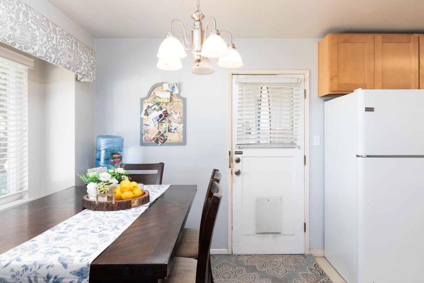 1226 Roxbury Court Santa Clara, CA 95050 - Photo 26 of 35 a dining room with furniture and window