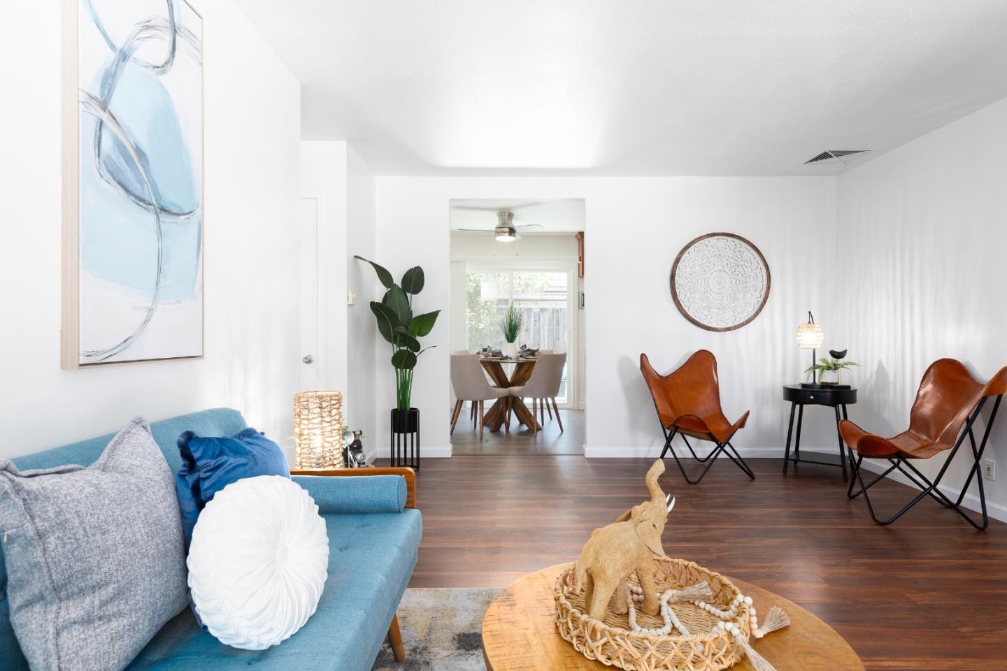 1226 Roxbury Court Santa Clara, CA 95050 - Photo 4 of 35 a living room with furniture a rug and wooden floor