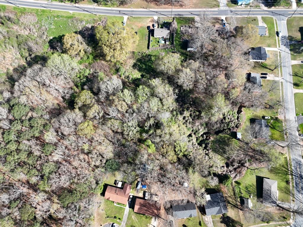 200 West Washington Street Newnan, GA 30263 - Photo 12 of 14 a view of outdoor space with lots of trees