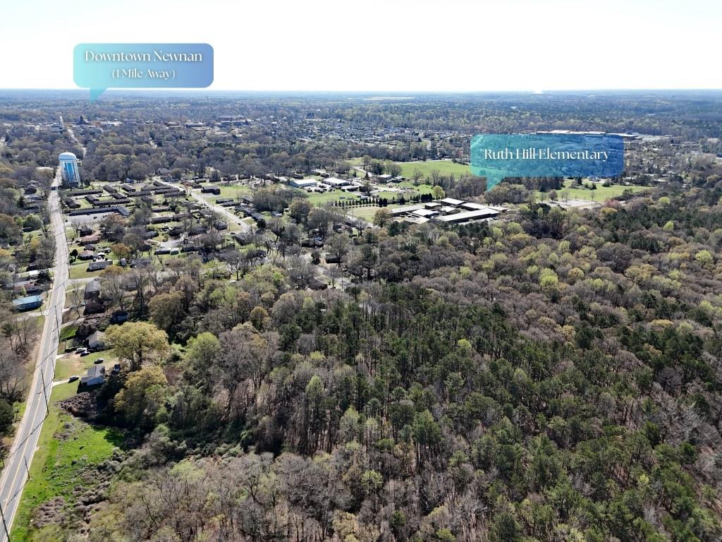 200 West Washington Street Newnan, GA 30263 - Photo 5 of 14 an aerial view of multiple house