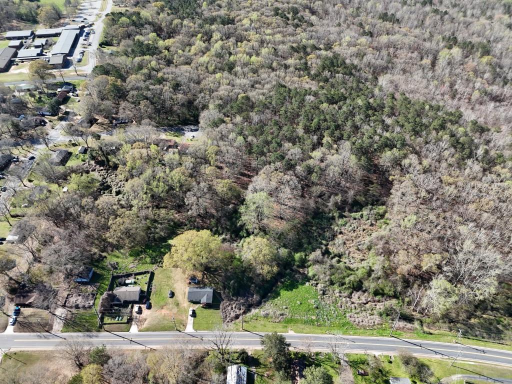200 West Washington Street Newnan, GA 30263 - Photo 7 of 14 an aerial view of a houses with yard