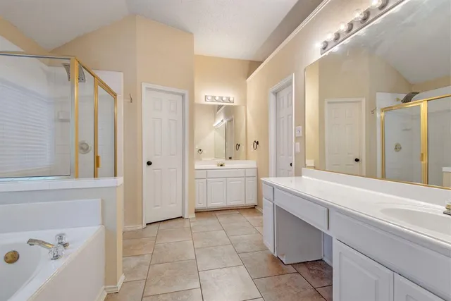 a bathroom with a sink a toilet and a bathtub
