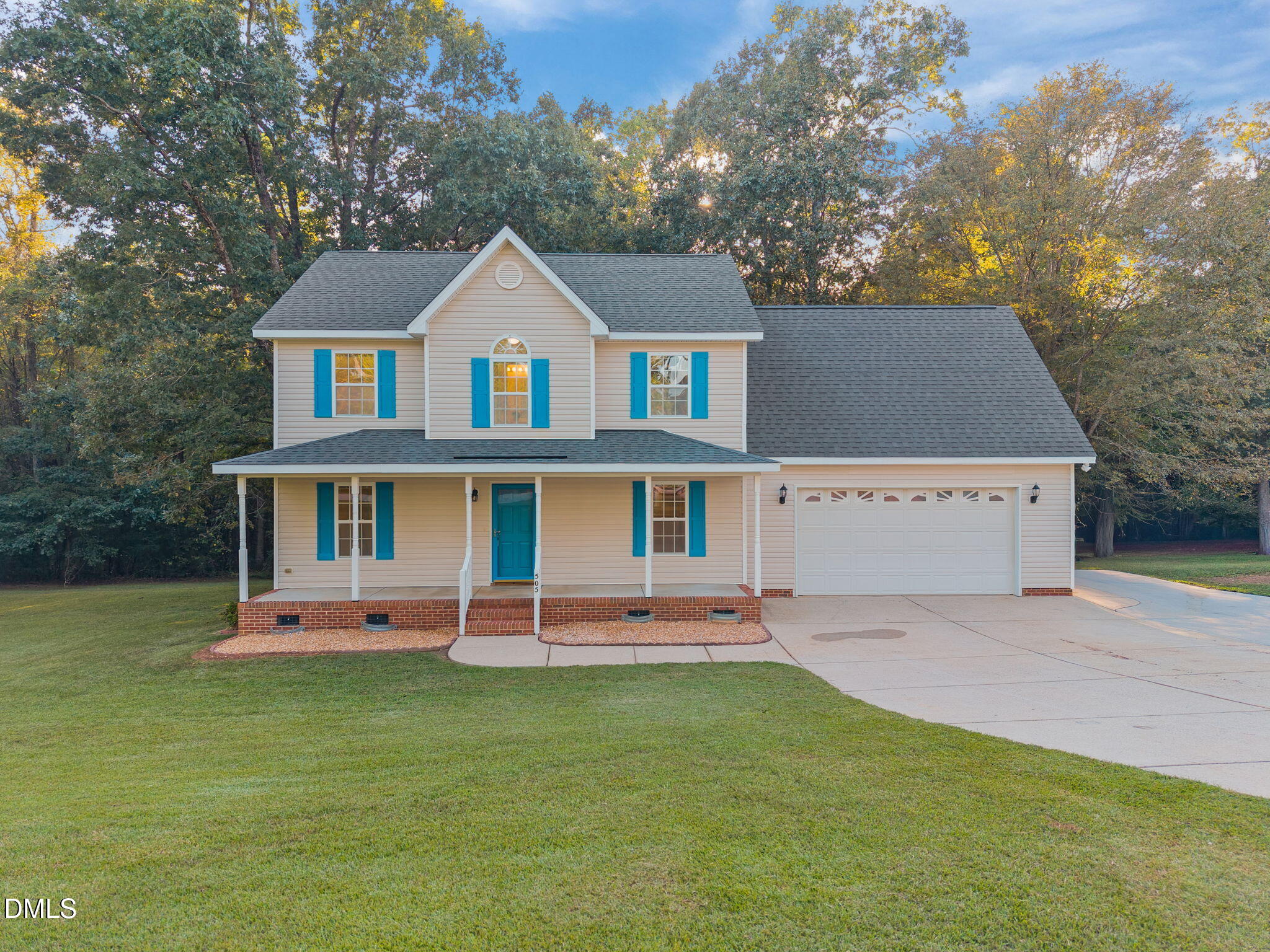 505 Vinson Road Clayton, NC 27527 - Photo 3 of 31 front view of house with a yard