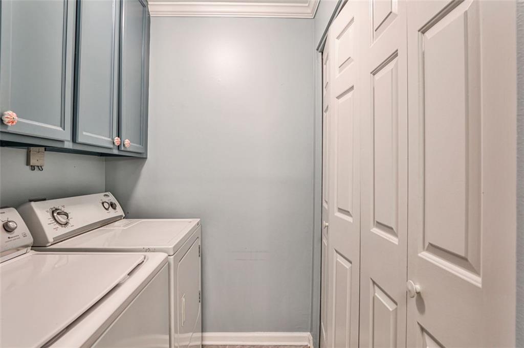 214 Ridley Howard Court Decatur, GA 30030 - Photo 20 of 28 a utility room with dryer and washer