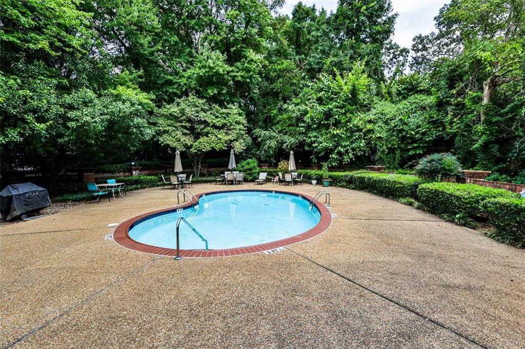 214 Ridley Howard Court Decatur, GA 30030 - Photo 23 of 28 a view of outdoor space and swimming pool