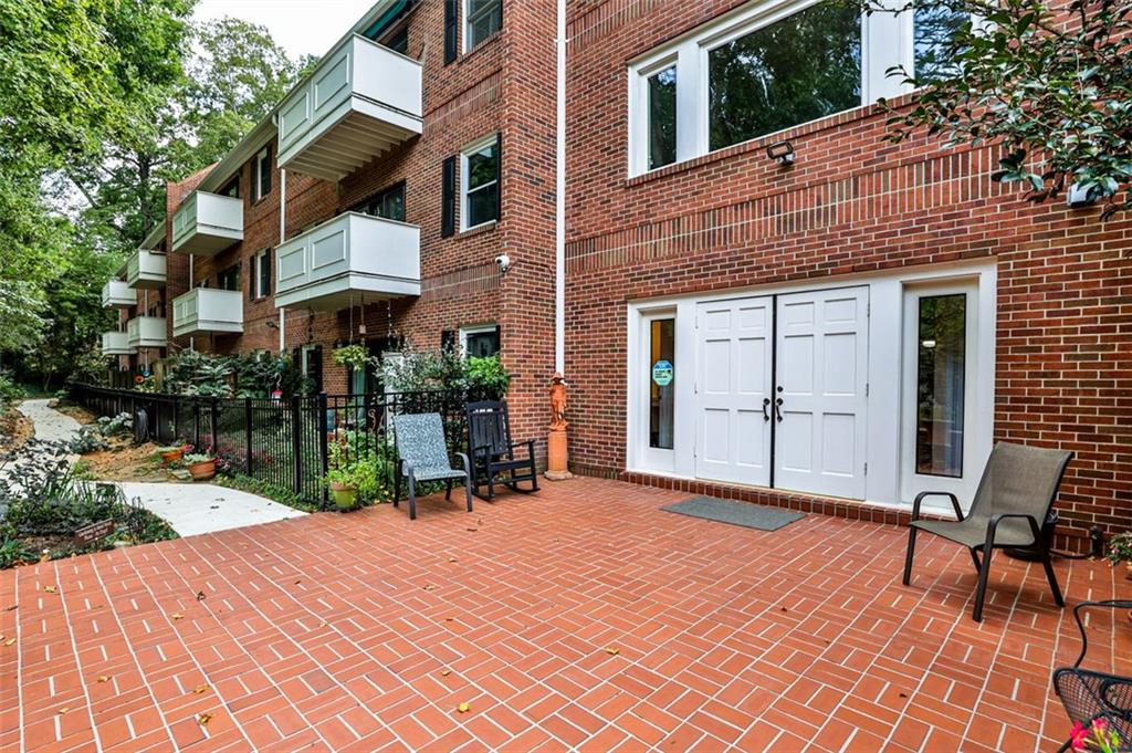 214 Ridley Howard Court Decatur, GA 30030 - Photo 24 of 28 a backyard of a house with seating space