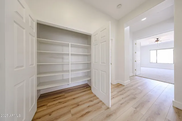 a bath tub sitting next to a window