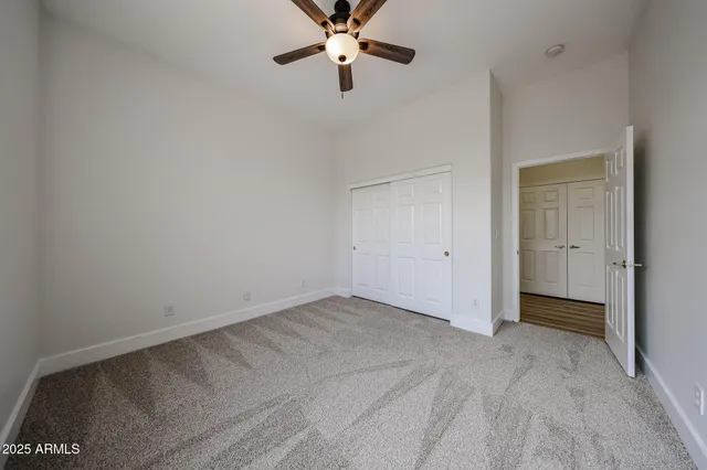 a view of an empty walk in closet
