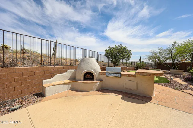 a view of a town with mountains in the background