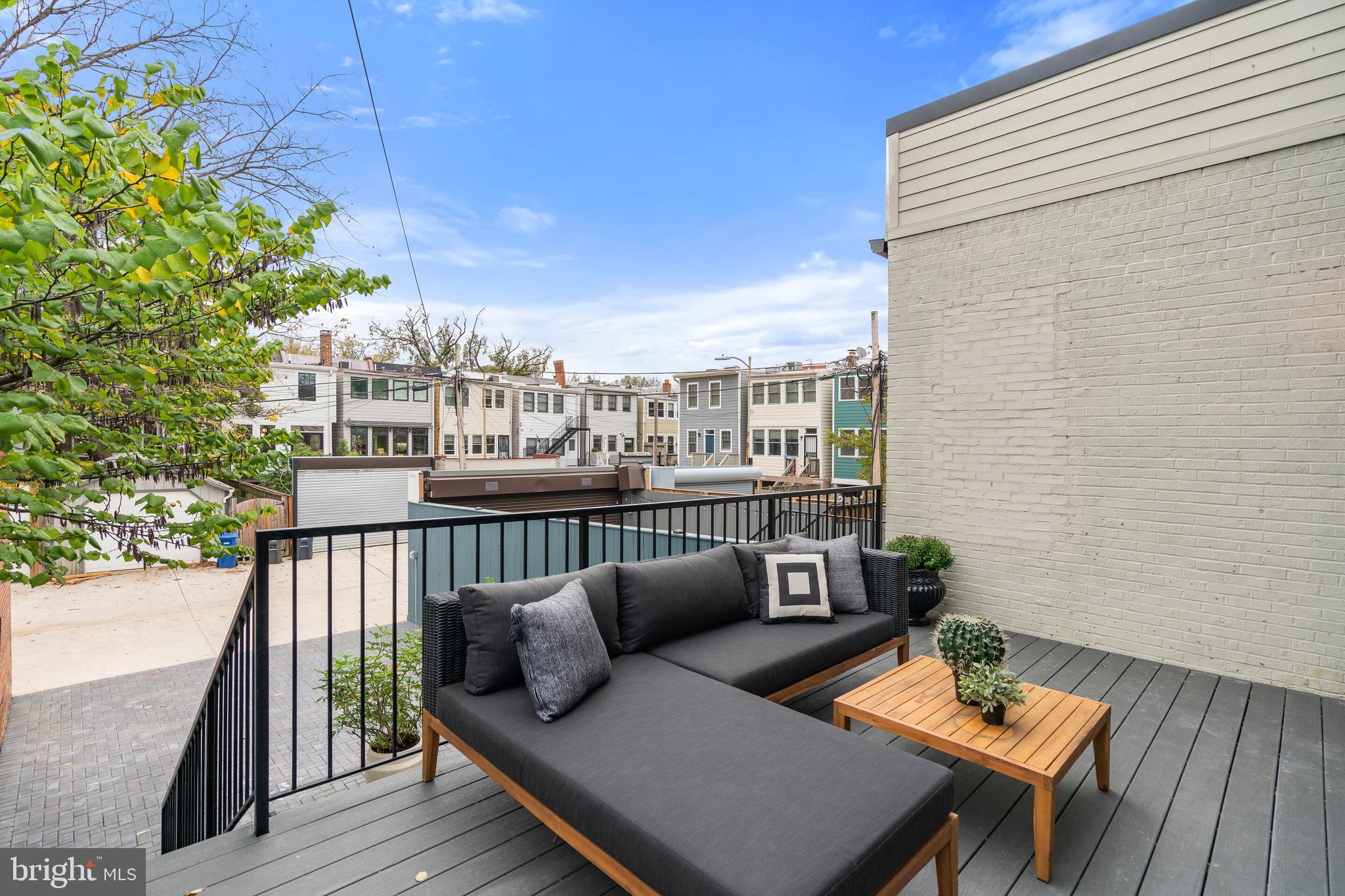 240 10th Street Southeast Washington, DC 20003 - Photo 16 of 47 Overlooking additional rear patio + parking