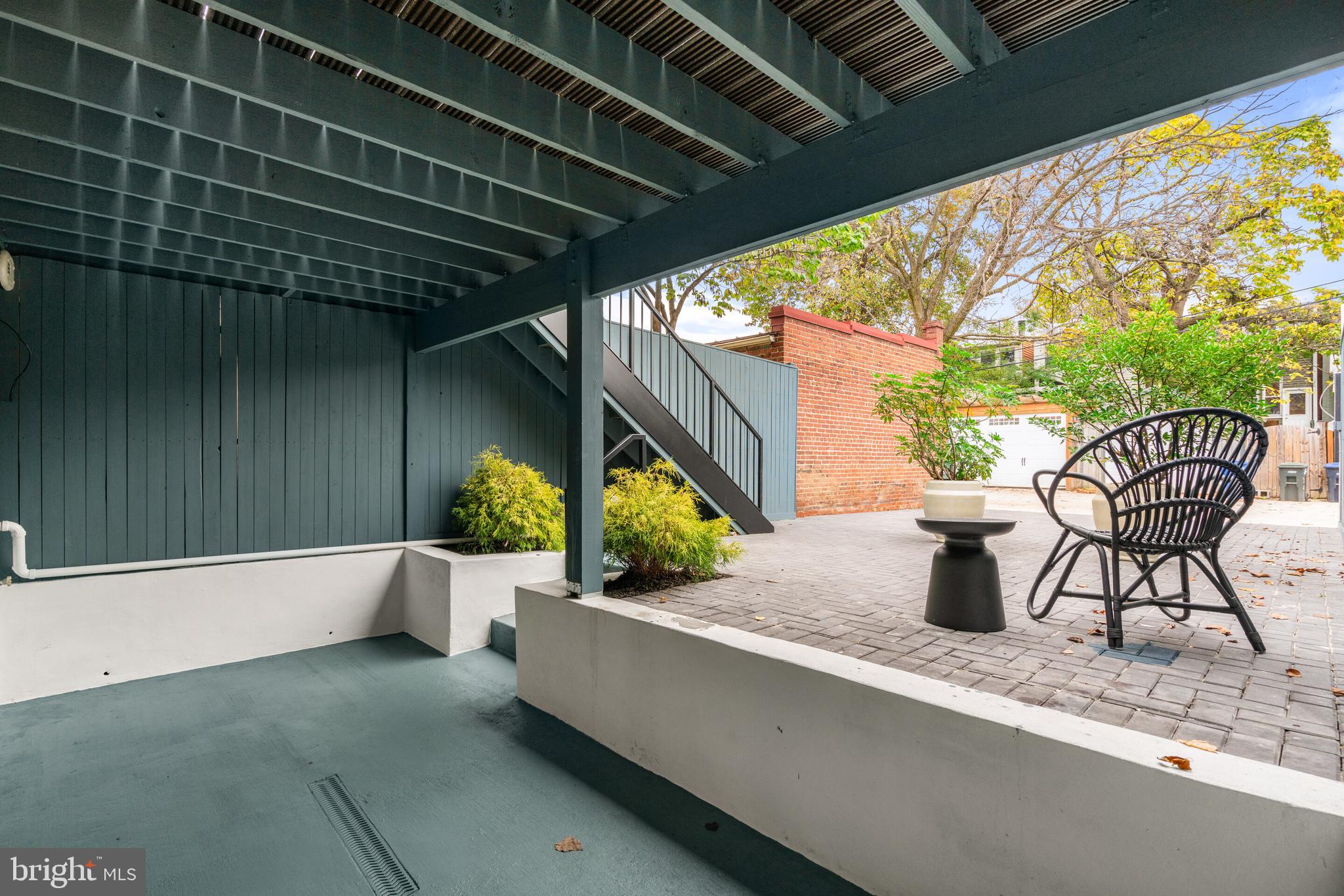 240 10th Street Southeast Washington, DC 20003 - Photo 40 of 47 Step up to brick patio