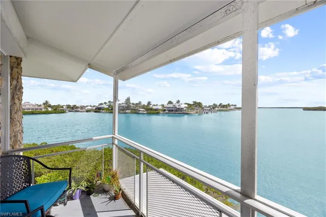 a view of a lake from a balcony