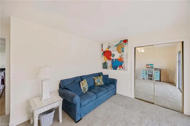 a living room with furniture and a couch