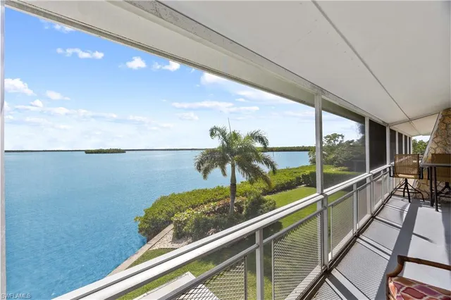 a view of a lake from a balcony