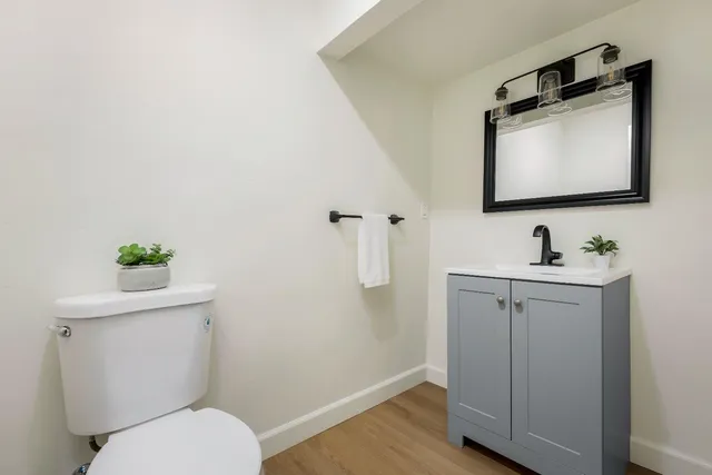 a view of living room with furniture and a chandelier