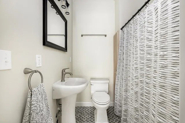 a view of workspace with furniture and window