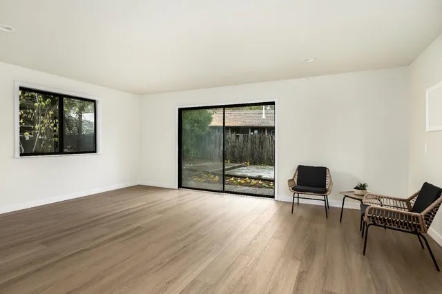 a view of swimming pool with outdoor seating