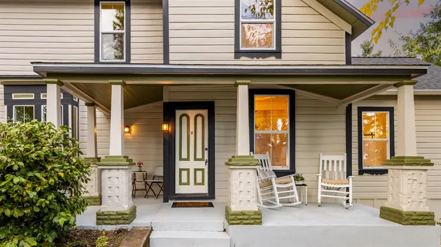 a front view of a house with a outdoor space