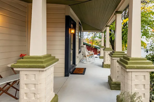 a bathroom with a sink and a large window