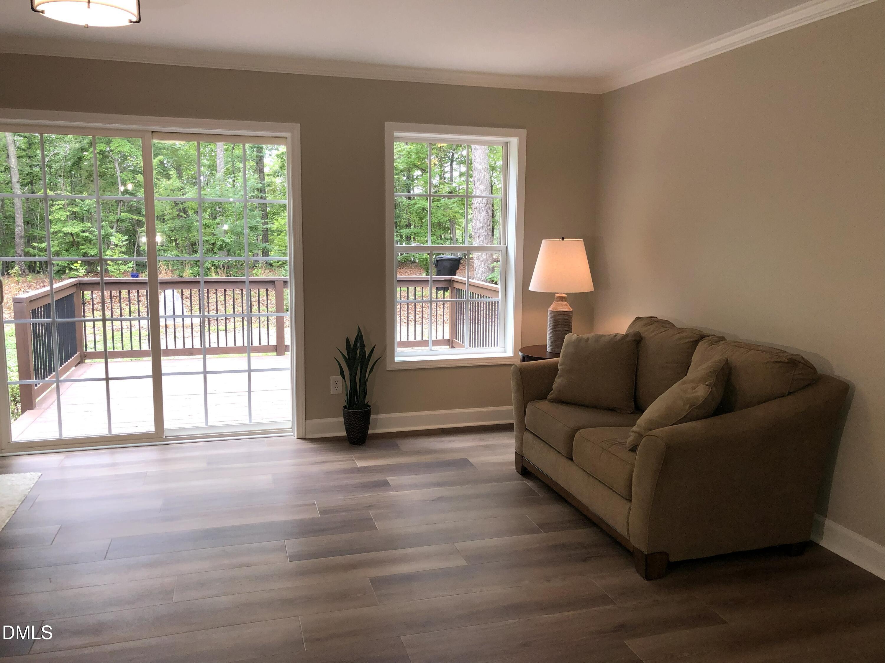95 Smith Taylor Trail Roxboro, NC 27574 - Photo 29 of 47 a living room with furniture and a large window