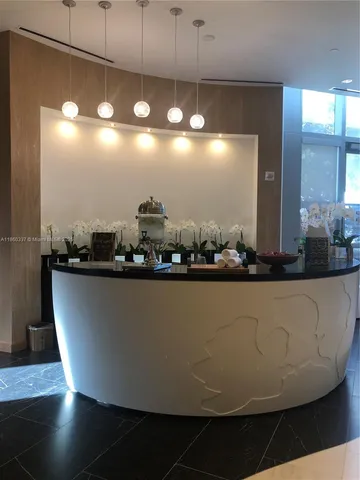 a view of a living room with furniture