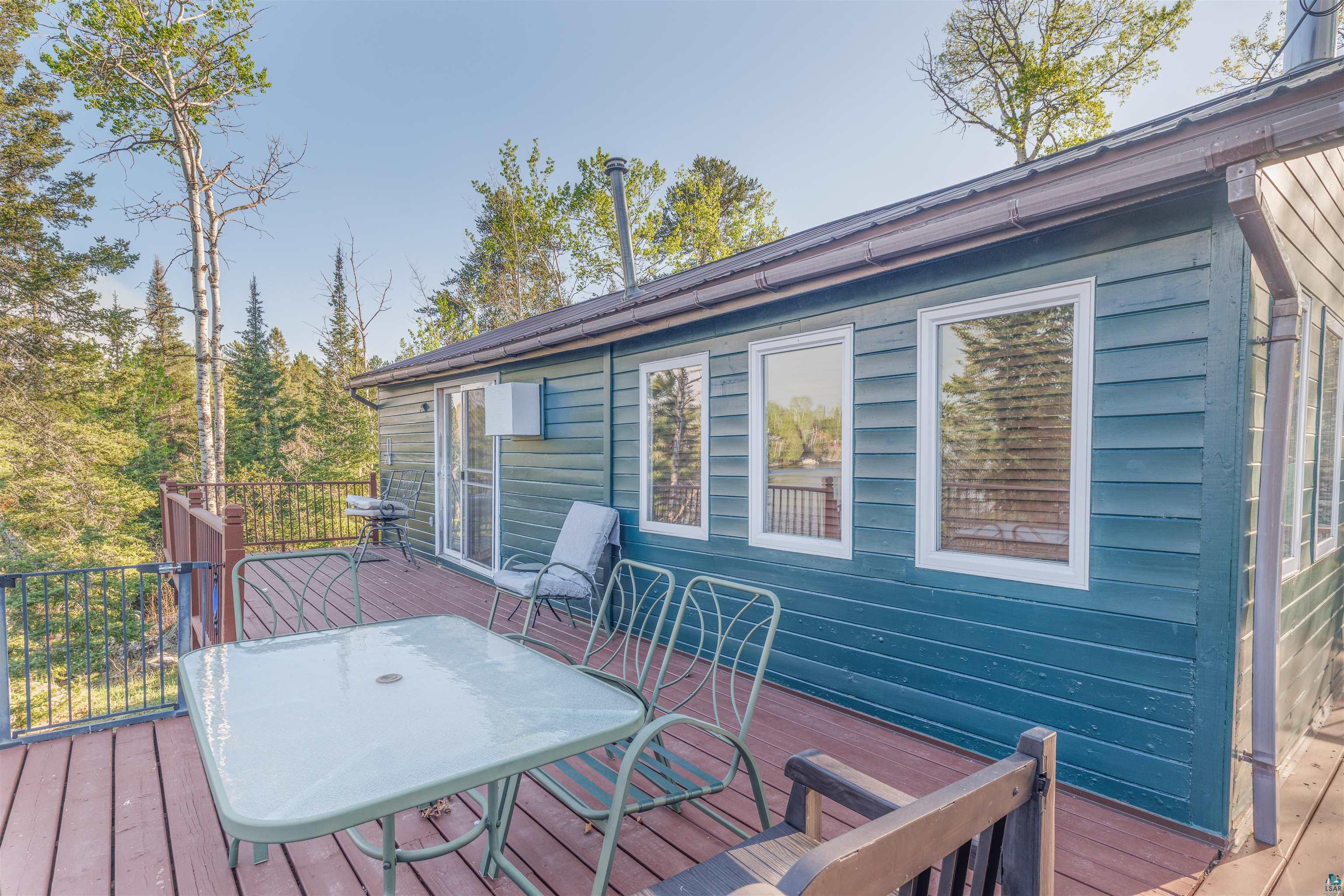 2377 Finn Road Babbitt, MN 55706 - Photo 14 of 32 Wooden deck with outdoor dining space