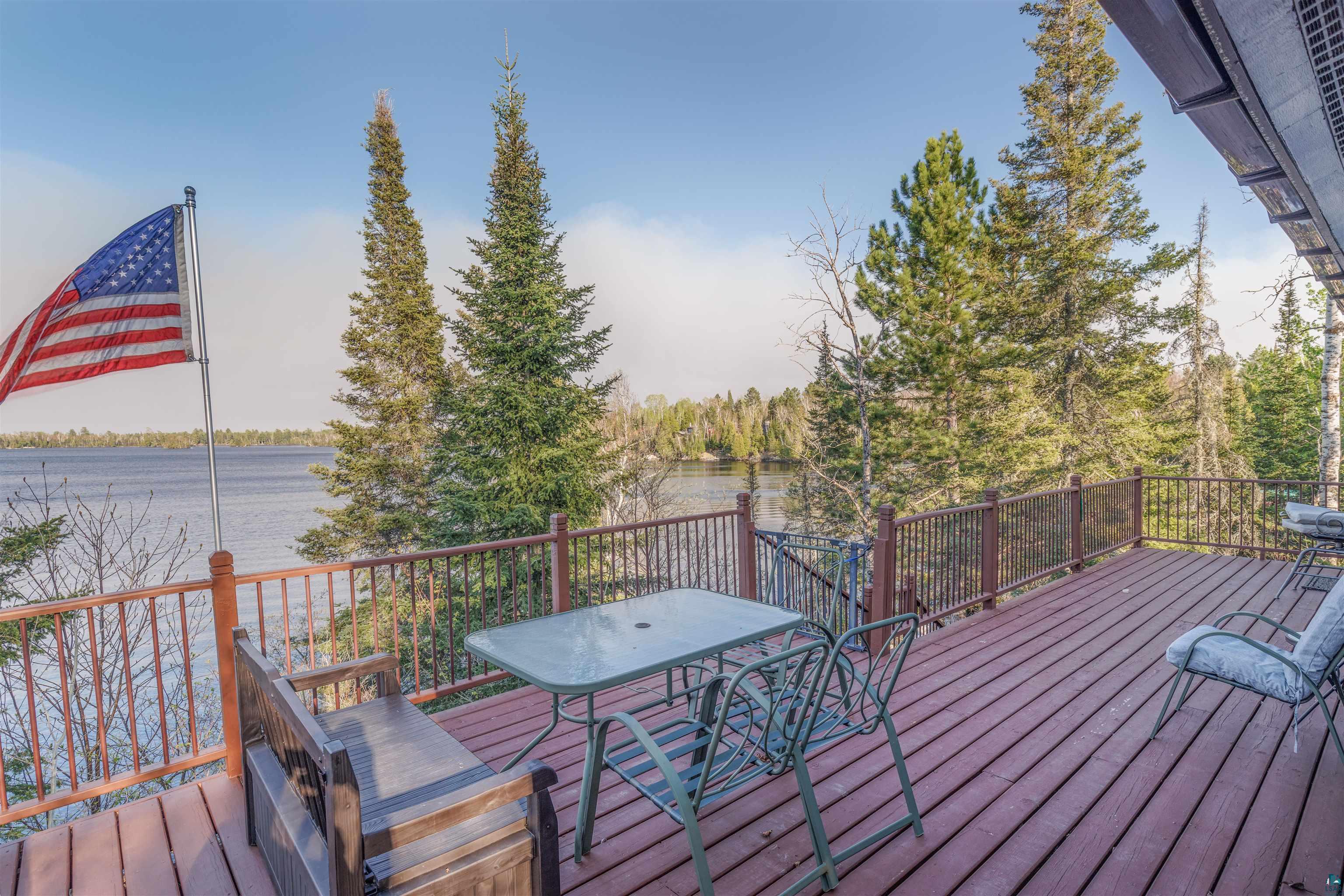 2377 Finn Road Babbitt, MN 55706 - Photo 15 of 32 Wooden deck featuring a water view and outdoor dining space