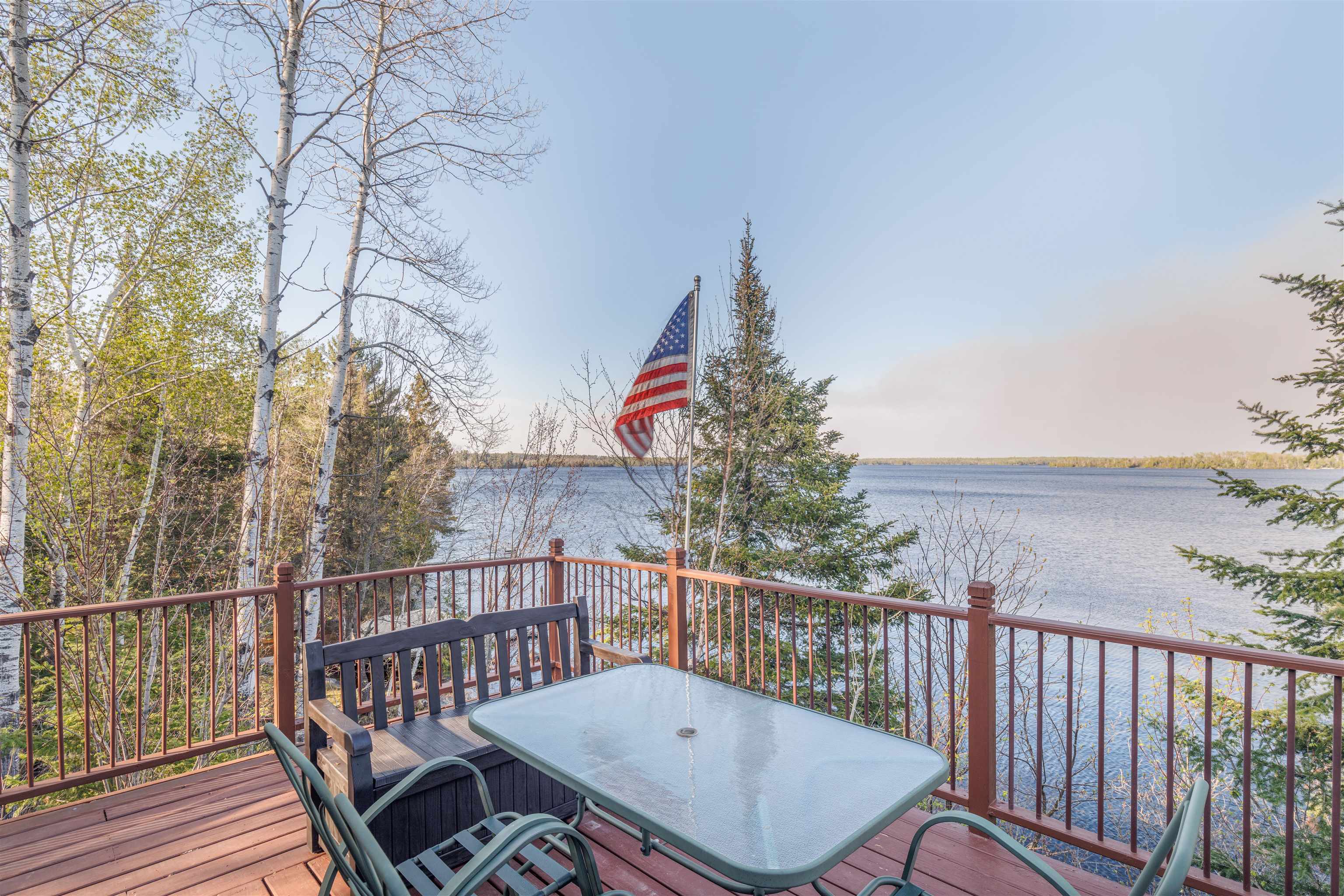 2377 Finn Road Babbitt, MN 55706 - Photo 2 of 32 Wooden terrace featuring a water view and outdoor dining space