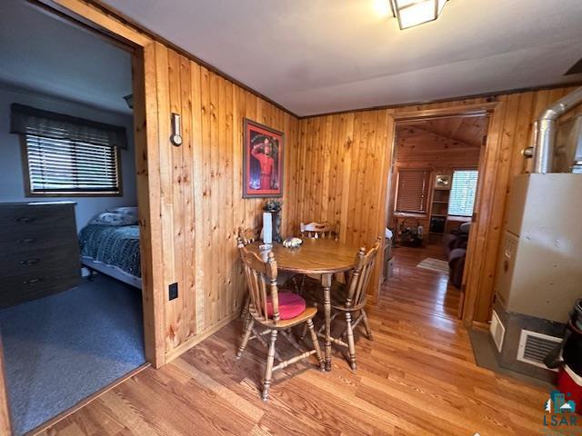 2377 Finn Road Babbitt, MN 55706 - Photo 4 of 32 Dining space featuring wooden walls and wood finished floors