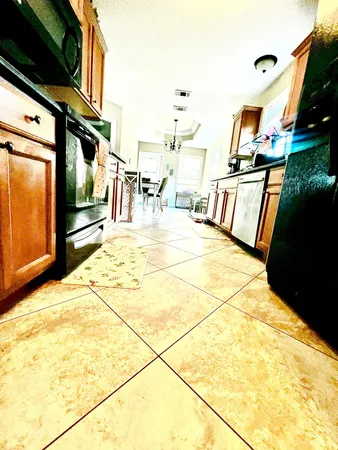 a view of a living room with a barbeque grill