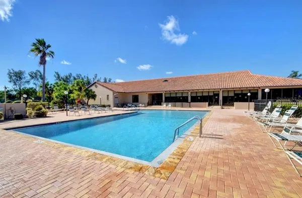 a view of a house with swimming pool