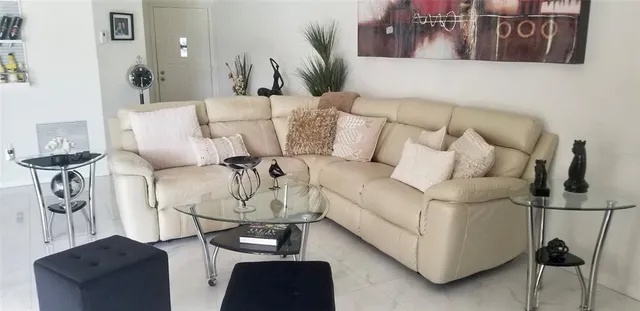 a living room with furniture and a couch