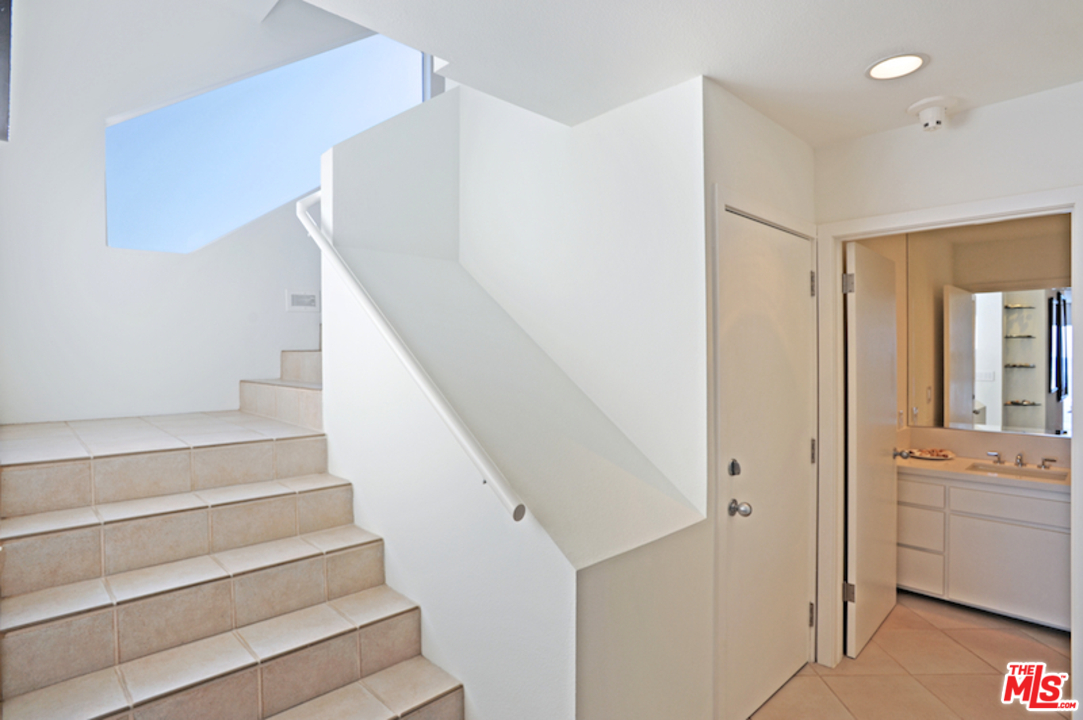 23952 Malibu Road Malibu, CA 90265 - Photo 18 of 23 a view of entryway and hall with wooden floor
