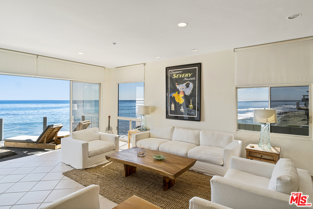 23952 Malibu Road Malibu, CA 90265 - Photo 6 of 23 a living room with furniture and kitchen view